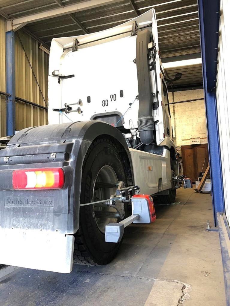 Réglage du train roulant d'un camion